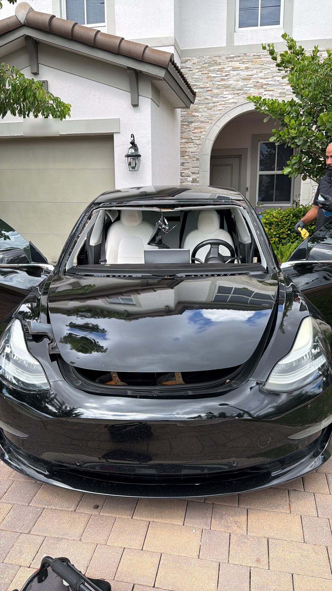 Tesla Model 3 with the old windshield removed